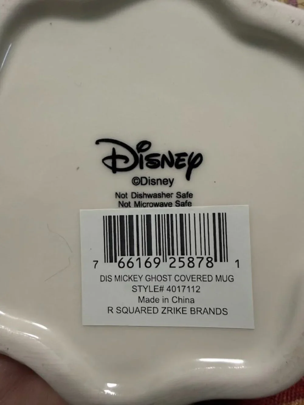 This Disney Mickey Mouse Ghost Coffee Mug with Ears Lid is a unique and fun